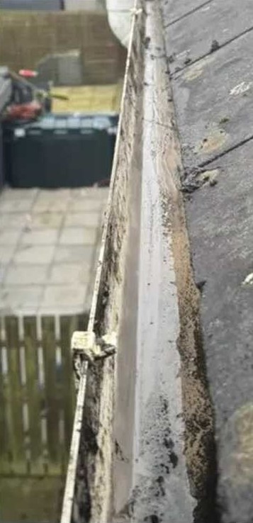 The same gutter after clearing